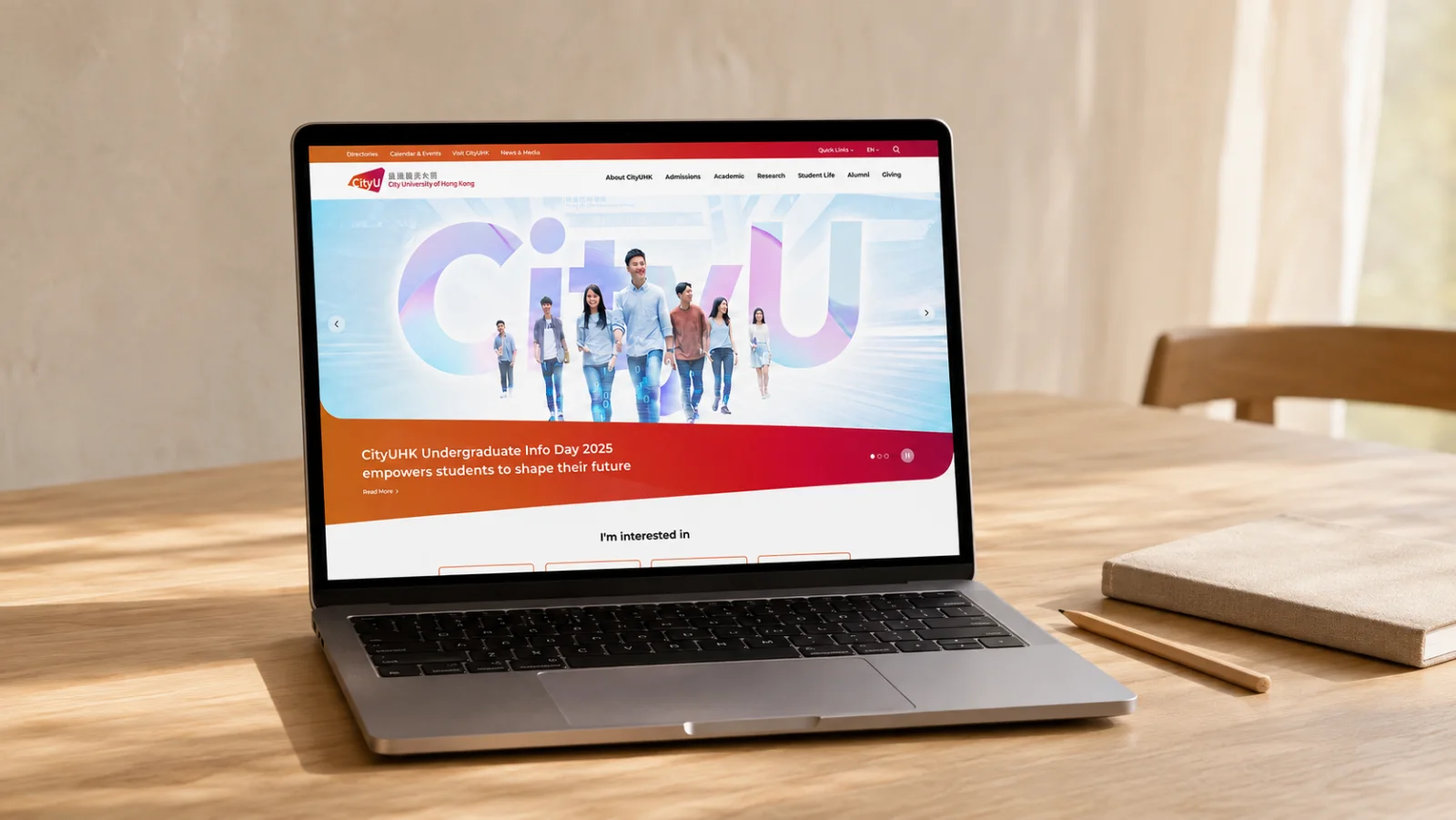 A portfolio presentation study showing a university website across a desktop display and interface details
